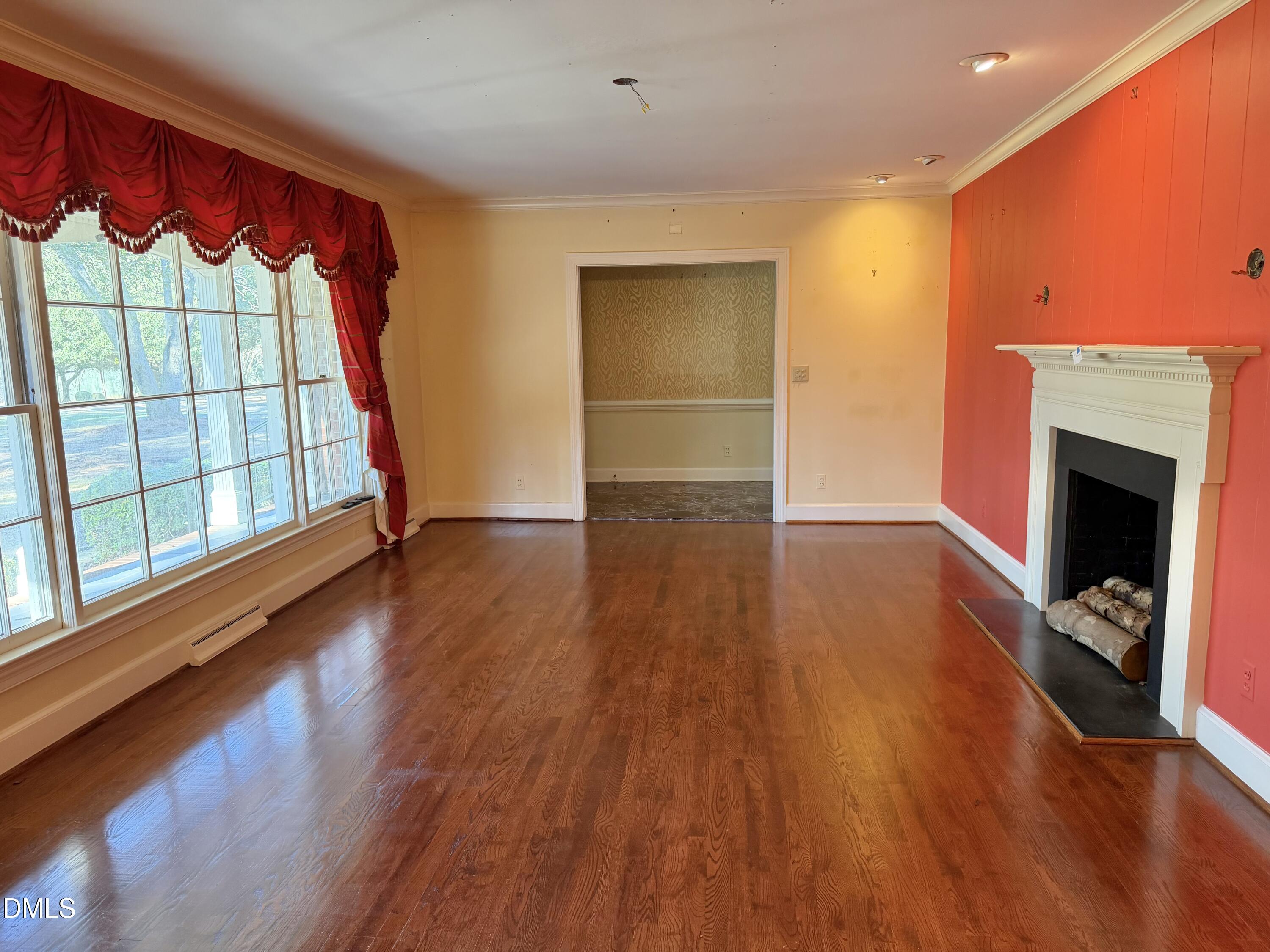 173 Park Circle Faison, NC 28341 - Photo 25 of 56 wooden floor in an empty room with a window