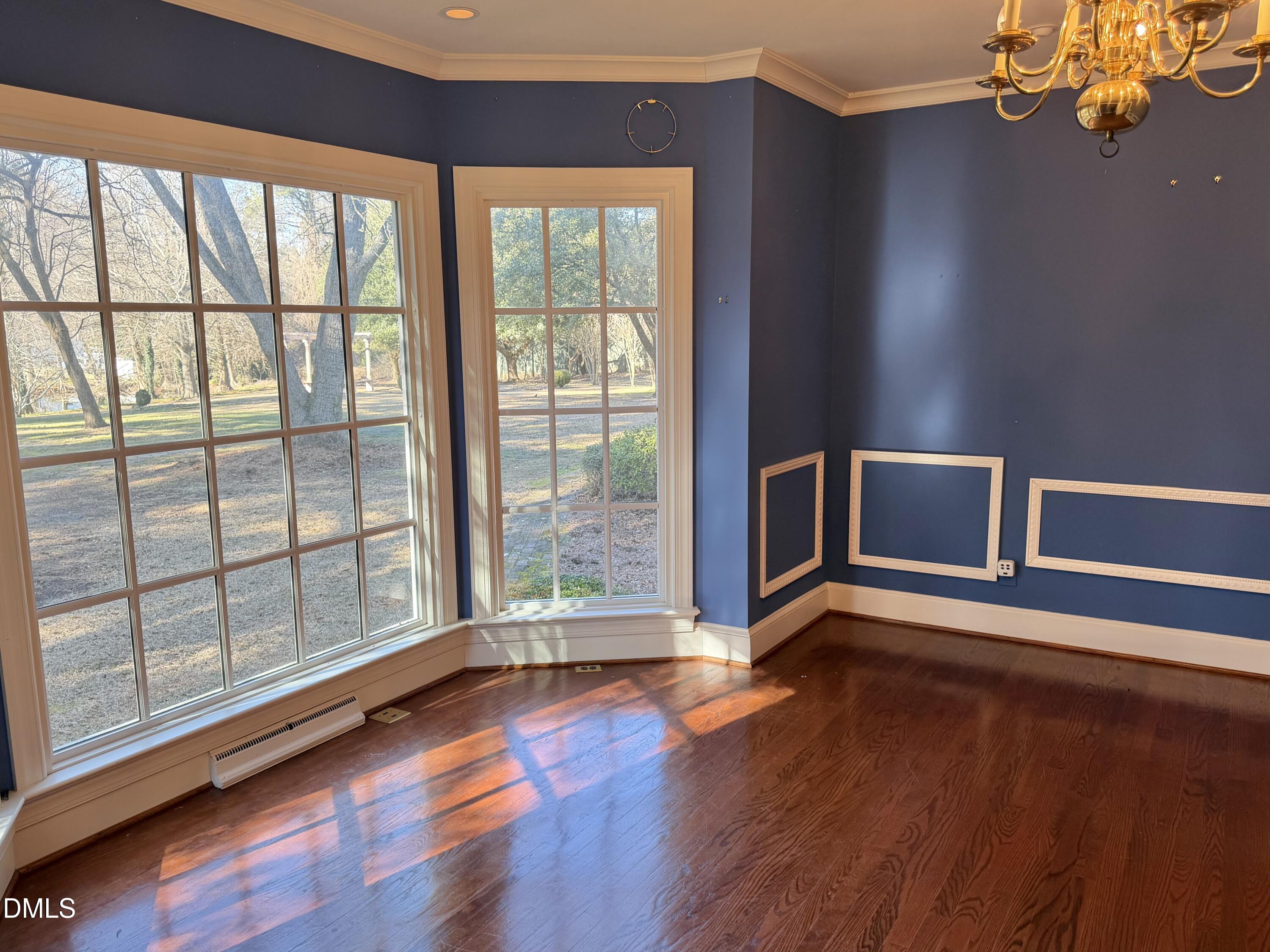 173 Park Circle Faison, NC 28341 - Photo 33 of 56 a view of an empty room with wooden floor and a window