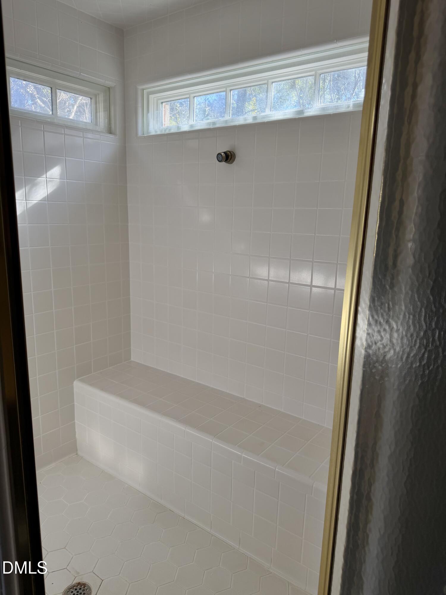 173 Park Circle Faison, NC 28341 - Photo 51 of 56 a bathroom with a bathtub