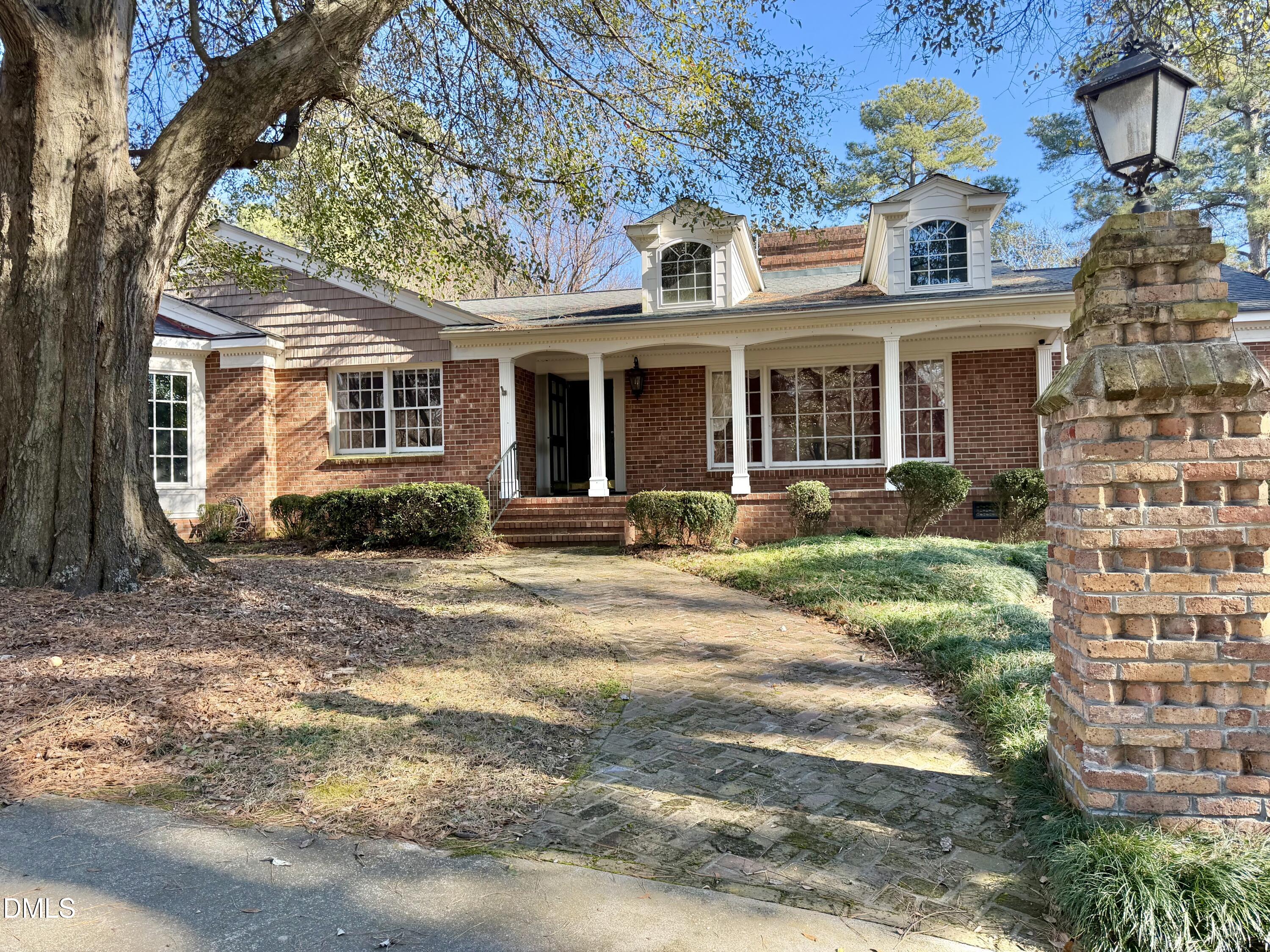 173 Park Circle Faison, NC 28341 - Photo 4 of 56 a front view of a house with garden