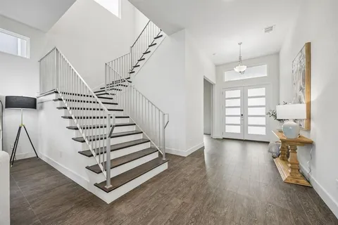 an empty room with fan and a ceiling fan