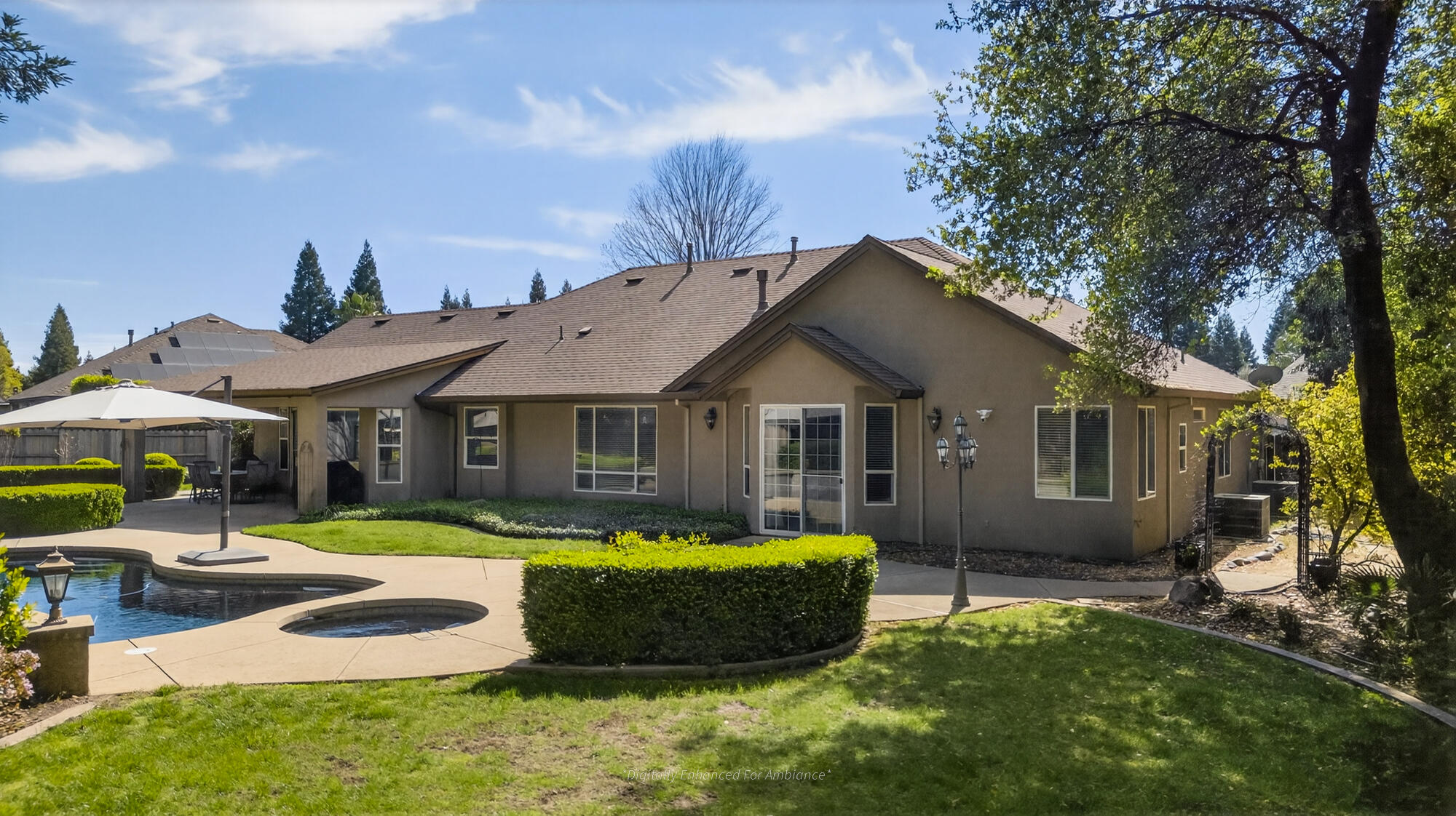 2722 Loggerhead Way Redding, CA 96002 - Photo 54 of 63 a front view of a house with a yard table and chairs