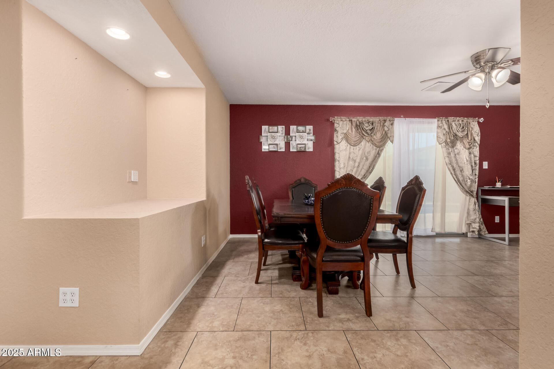 3529 West St Moritz Lane Phoenix, AZ 85053 - Photo 13 of 34 a view of a dining room with furniture and a window