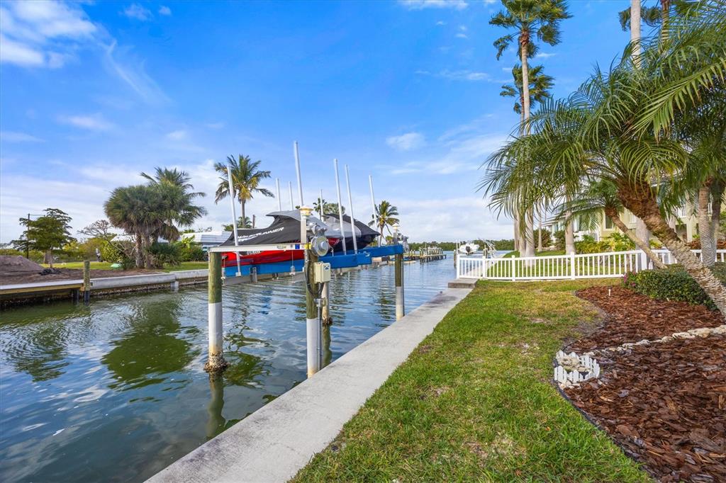 761 Norton Street Longboat Key, FL 34228 - Photo 58 of 66 a view of a water pond with a yard