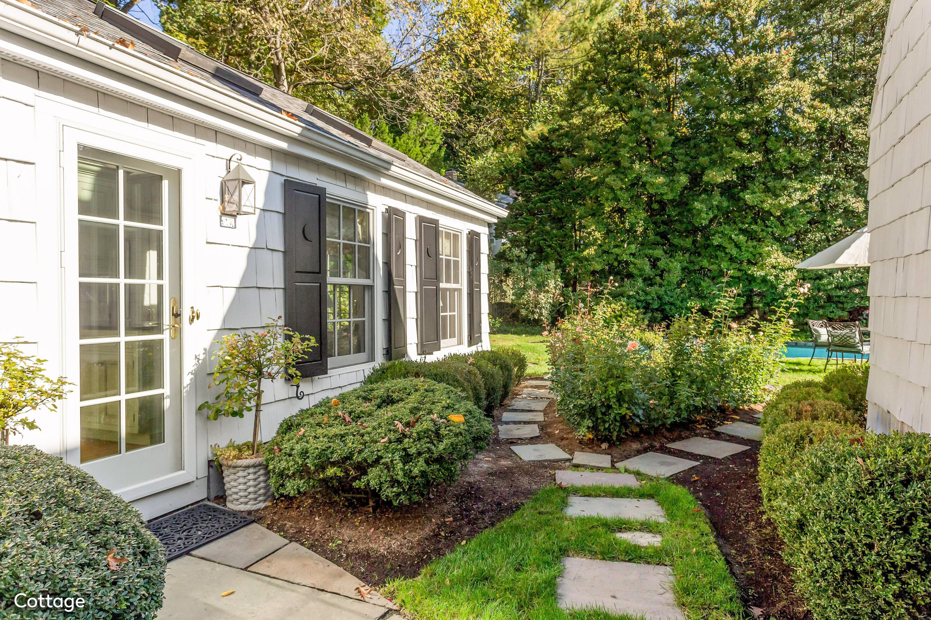 40 Birch Road Darien, CT 06820 - Photo 23 of 27 a house with a garden view