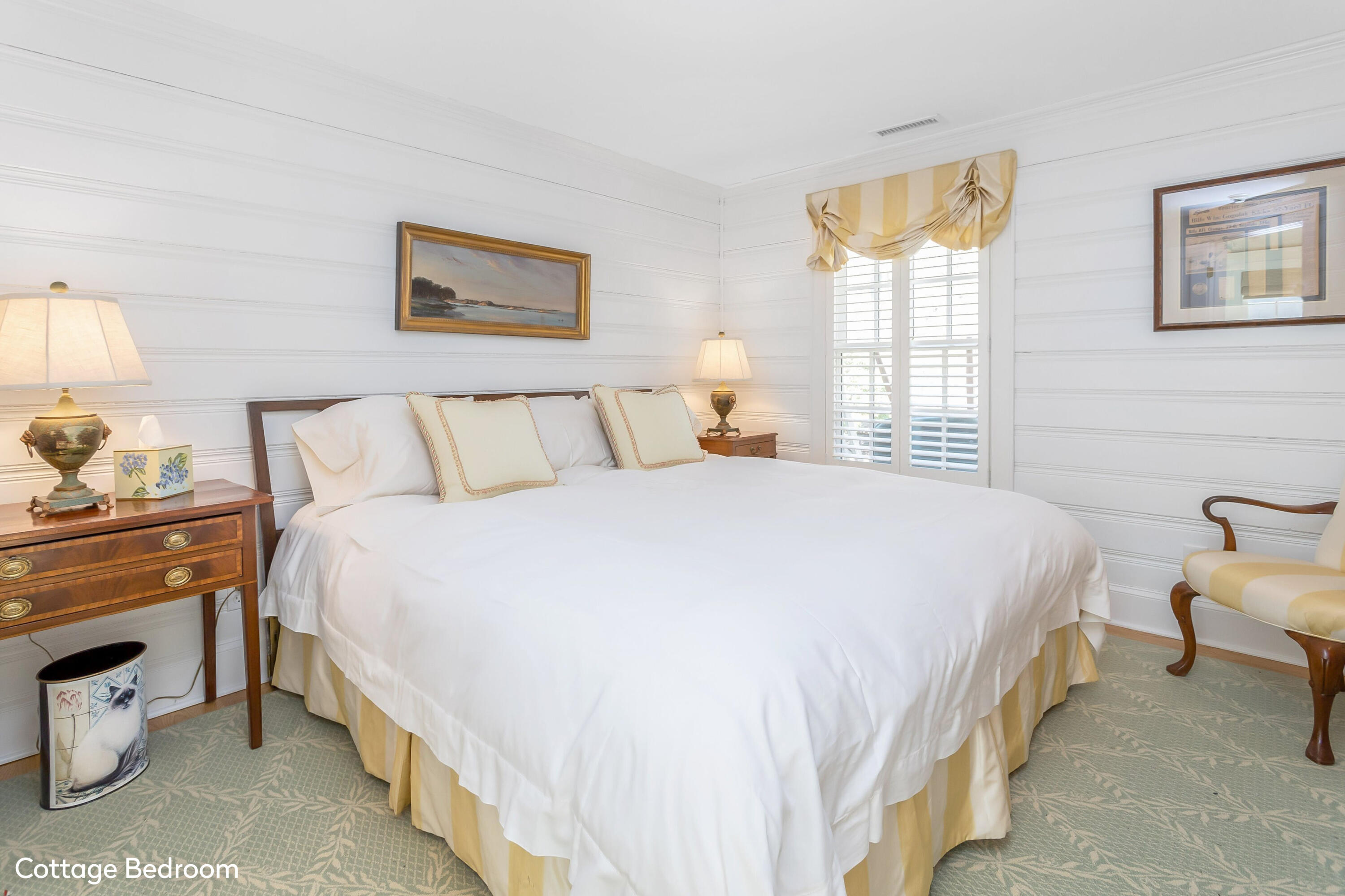 40 Birch Road Darien, CT 06820 - Photo 27 of 27 a bedroom with a bed and a lamp on dresser