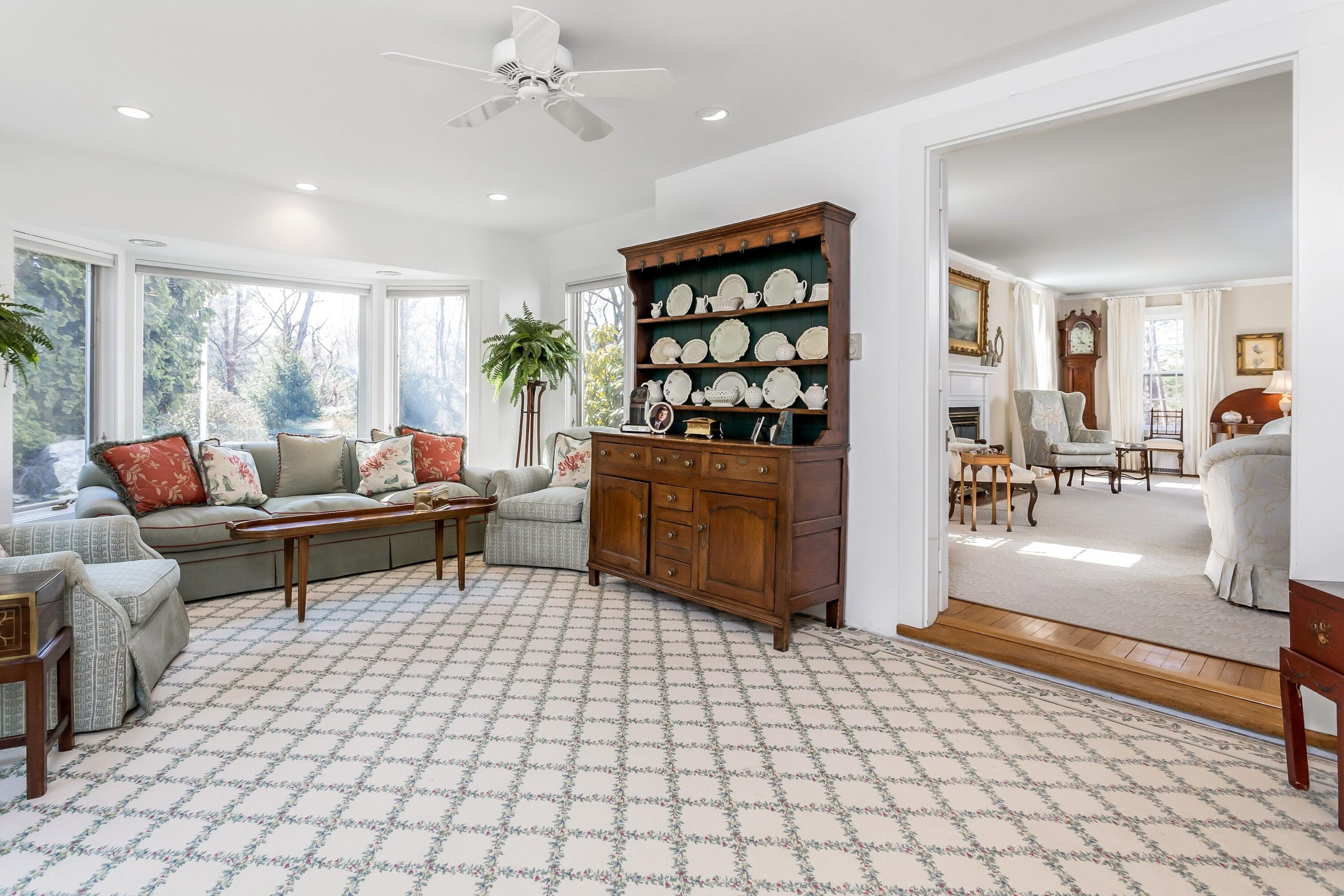 40 Birch Road Darien, CT 06820 - Photo 7 of 27 a living room with furniture and a table