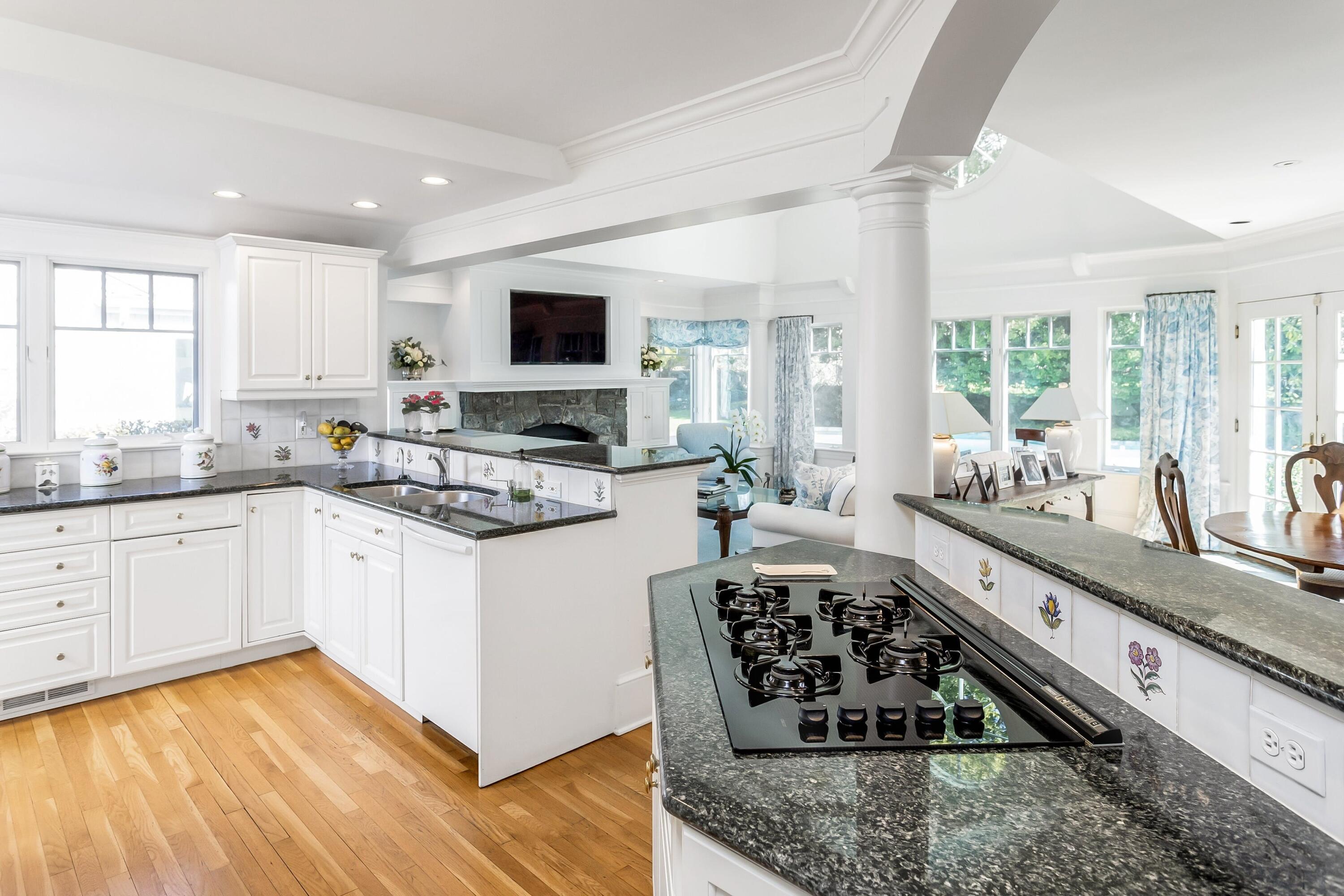 40 Birch Road Darien, CT 06820 - Photo 10 of 27 a kitchen with stainless steel appliances granite countertop a stove and a sink
