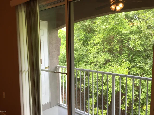 a view of a swimming pool with a lake