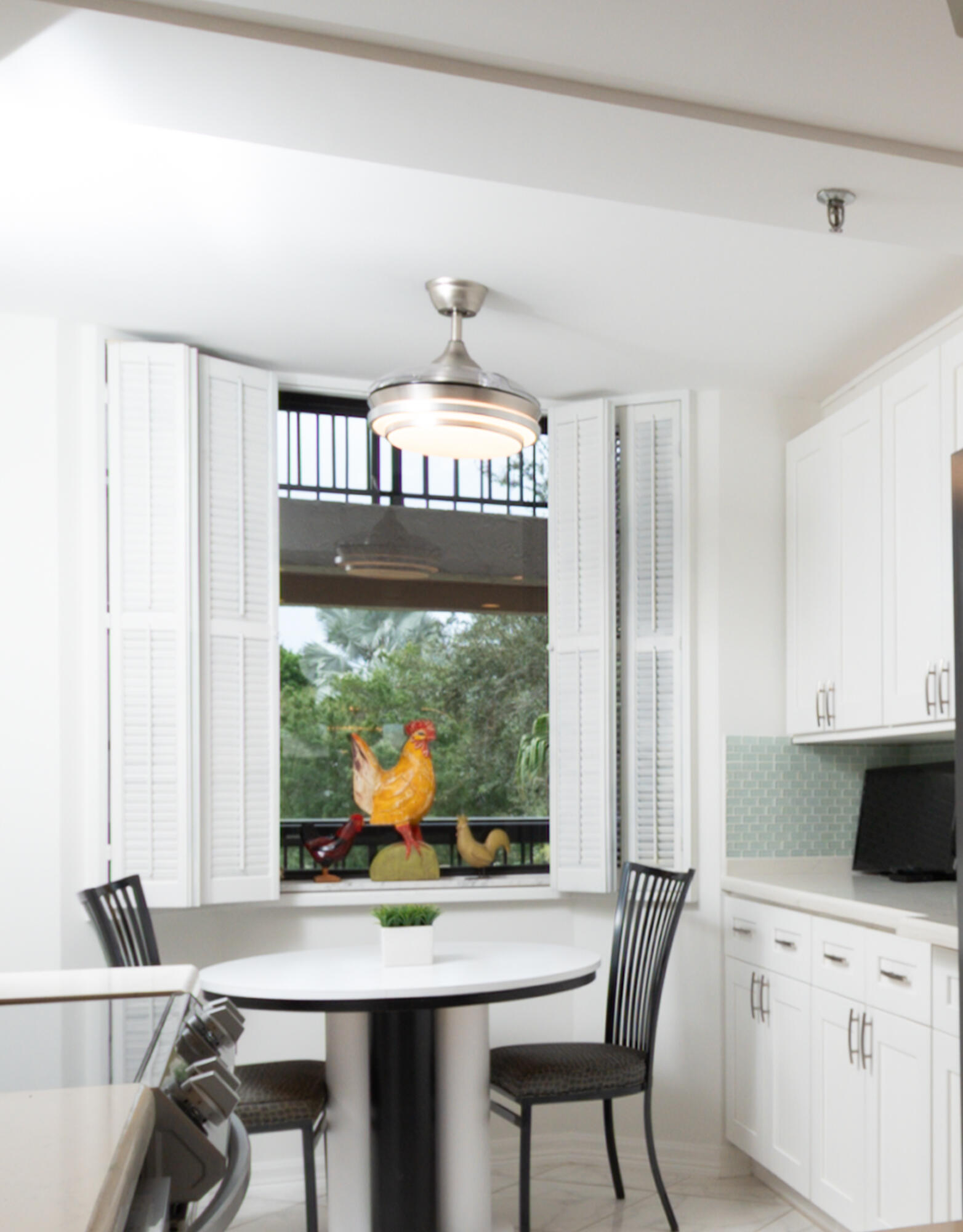 6420 Boca Del Mar Drive, Unit 308 Boca Raton, FL 33433 - Photo 11 of 37 a view of a dining room with furniture window and outside view