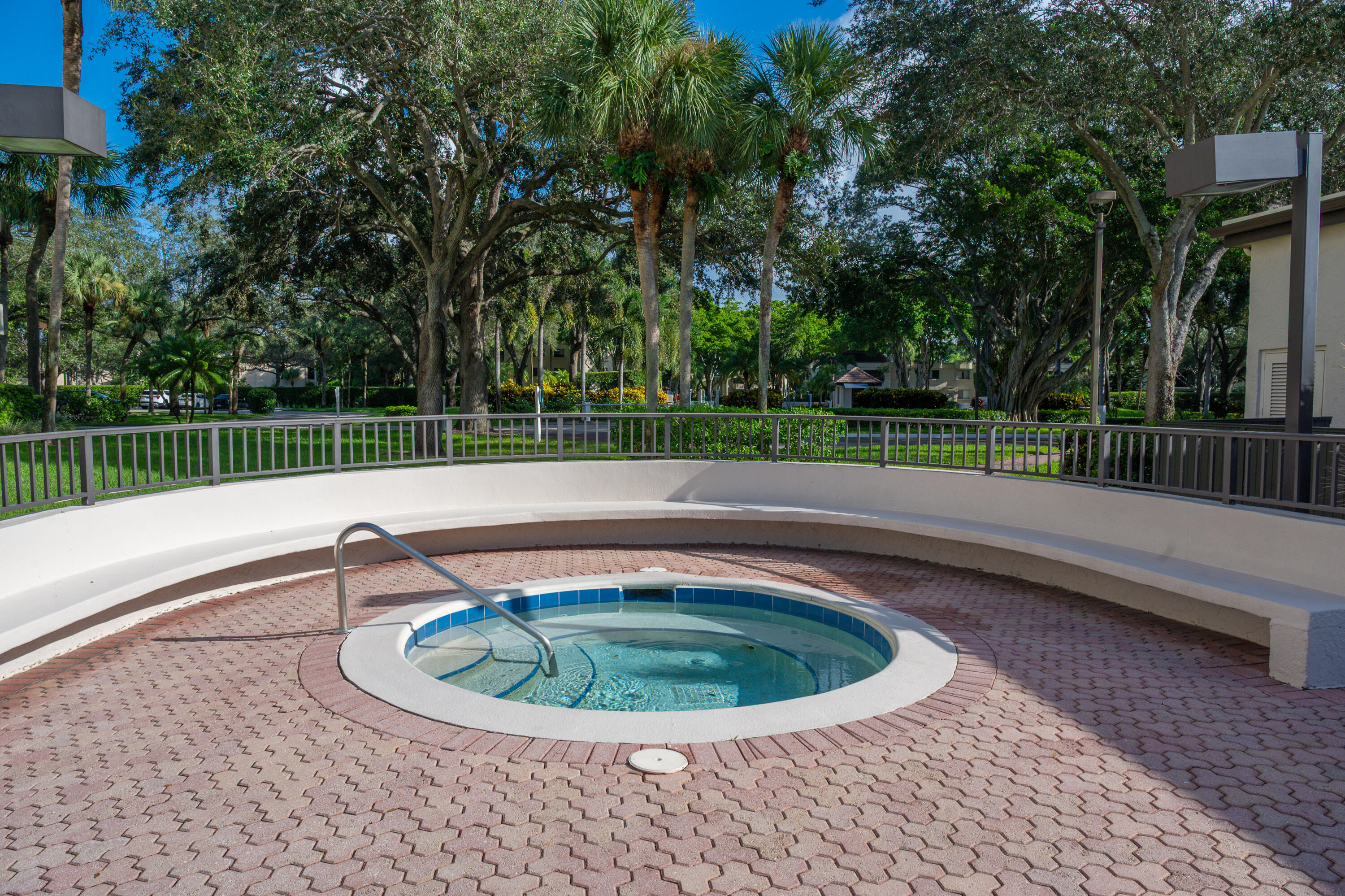 6420 Boca Del Mar Drive, Unit 308 Boca Raton, FL 33433 - Photo 22 of 37 a view of a swimming pool with a couches chairs