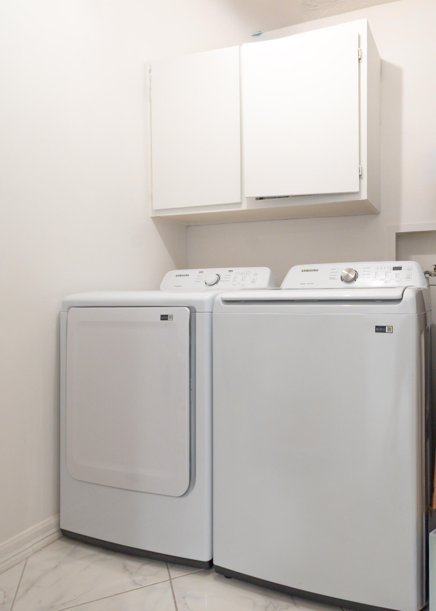 6420 Boca Del Mar Drive, Unit 308 Boca Raton, FL 33433 - Photo 27 of 37 a utility room with dryer and washer