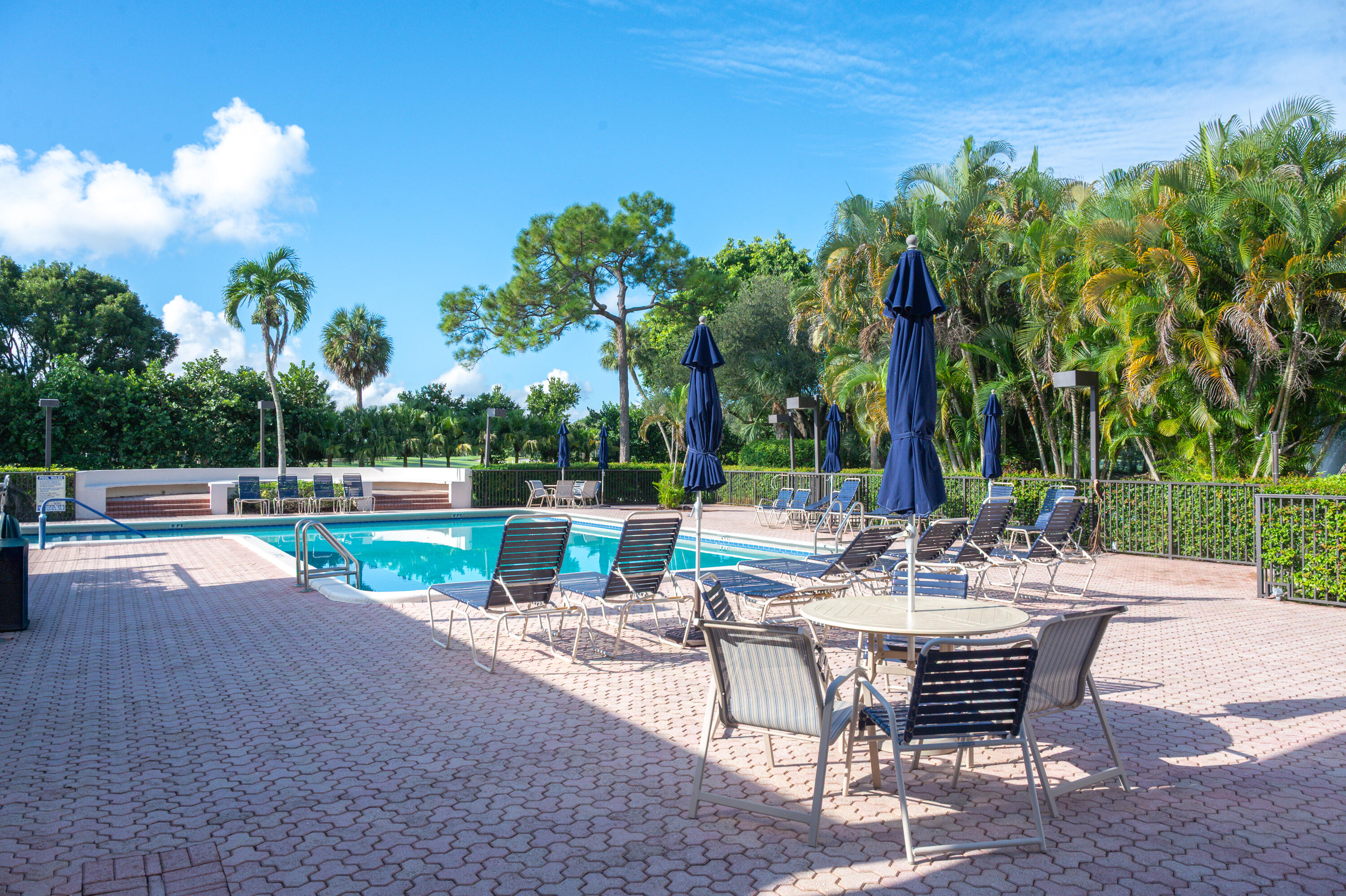 6420 Boca Del Mar Drive, Unit 308 Boca Raton, FL 33433 - Photo 34 of 37 a view of a patio with swimming pool