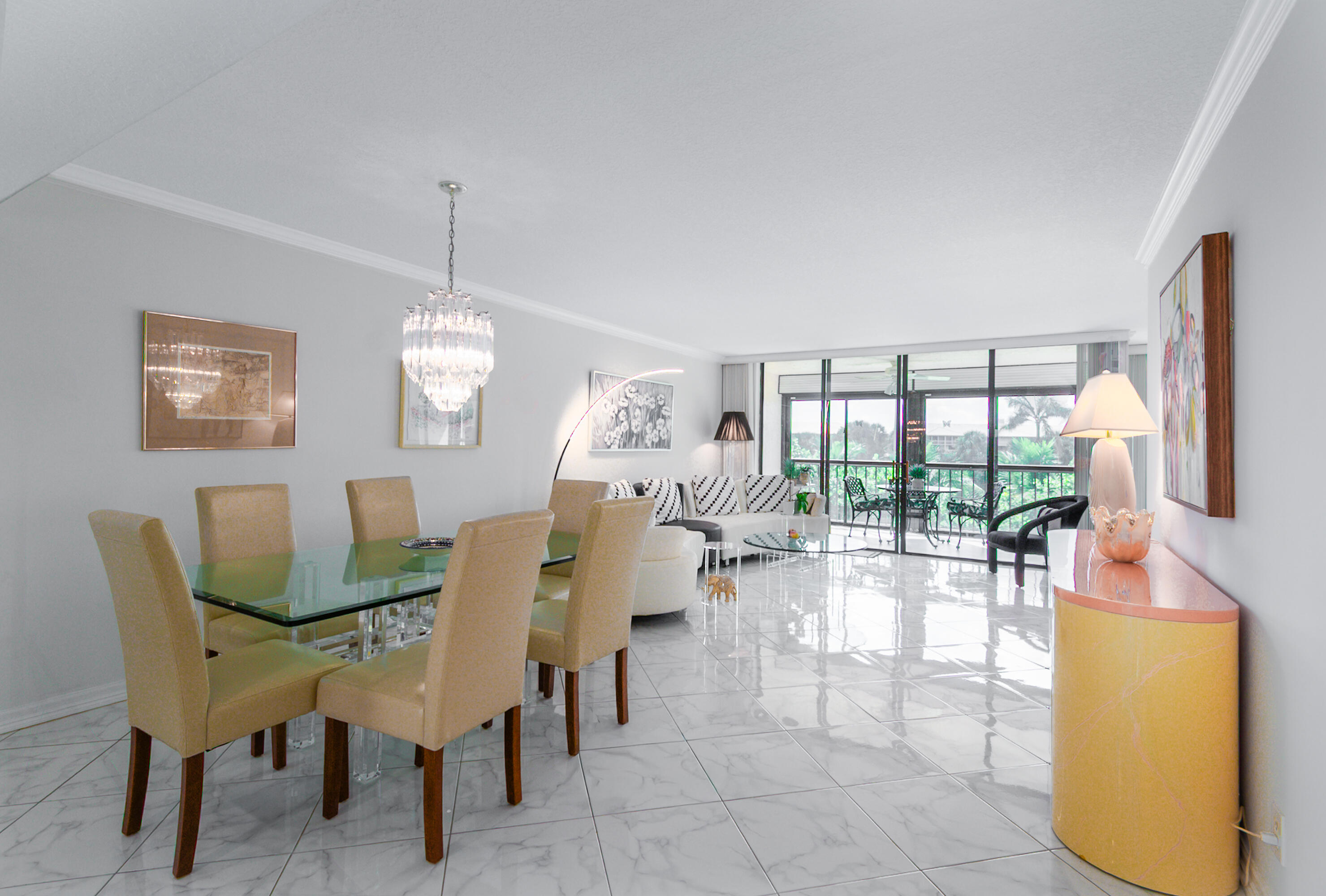 6420 Boca Del Mar Drive, Unit 308 Boca Raton, FL 33433 - Photo 4 of 37 a dining room with furniture a chandelier and fireplace