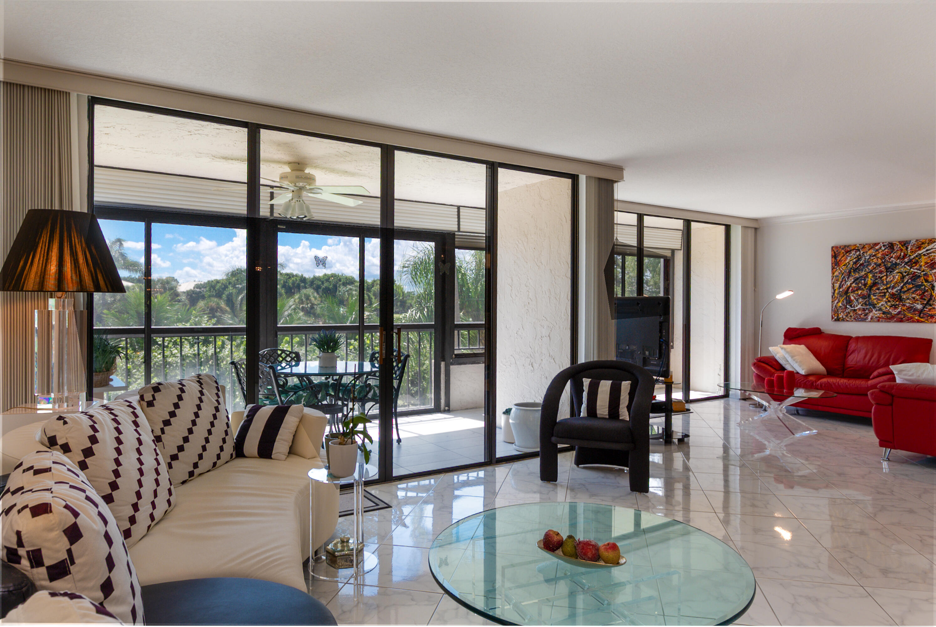 6420 Boca Del Mar Drive, Unit 308 Boca Raton, FL 33433 - Photo 6 of 37 a living room with furniture fireplace and a large window
