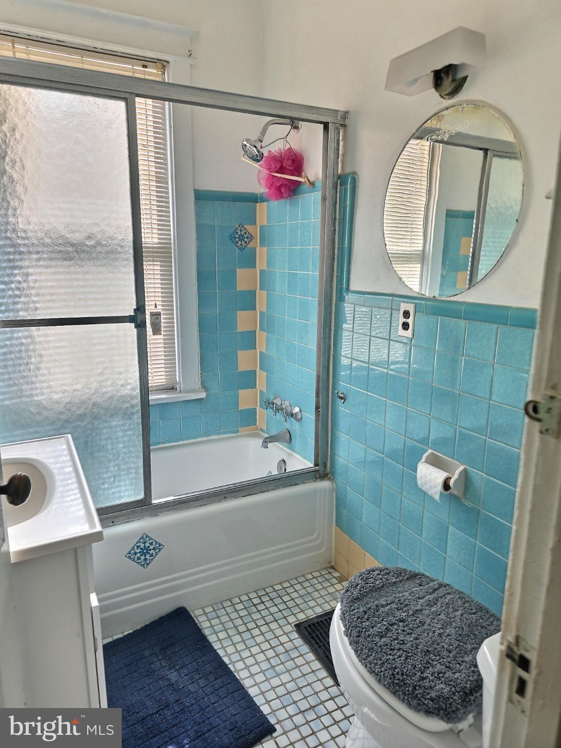 2040 31st Place Southeast Washington, DC 20020 - Photo 12 of 24 Charming vintage bathroom with teal tiles.