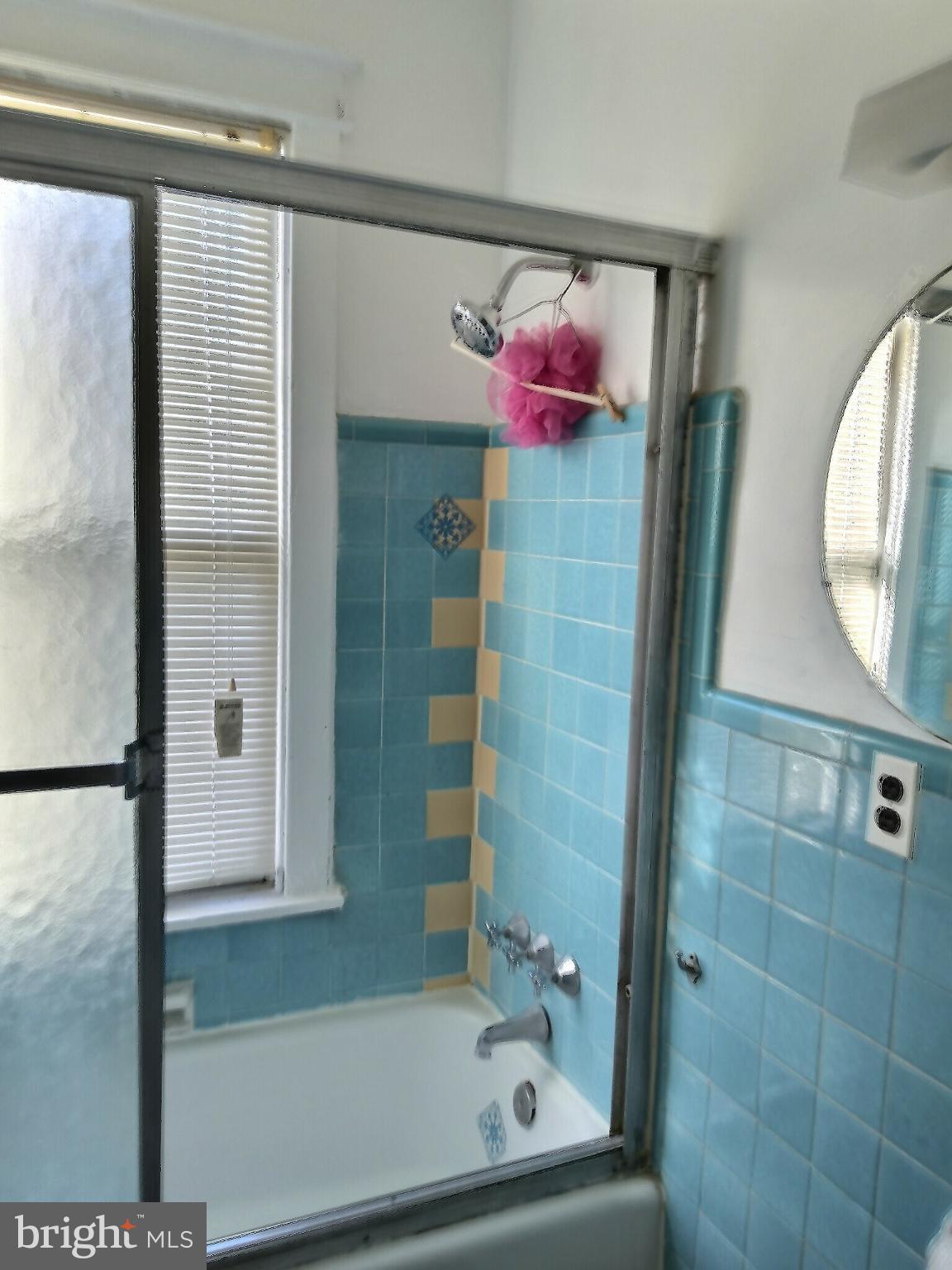 2040 31st Place Southeast Washington, DC 20020 - Photo 13 of 24 Charming bathroom with vintage tile accents.