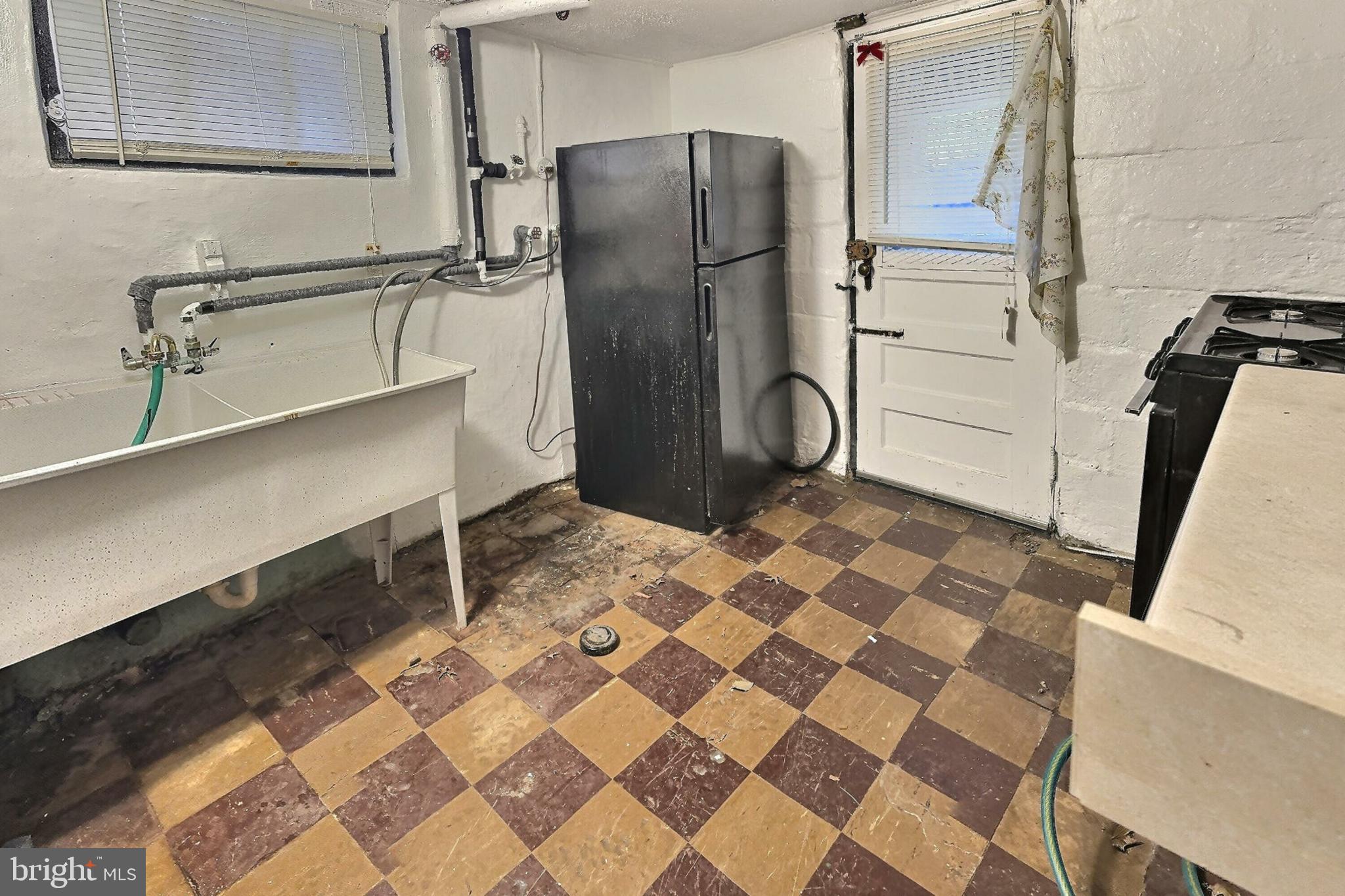 2040 31st Place Southeast Washington, DC 20020 - Photo 17 of 24 Spacious utility area with vintage charm.