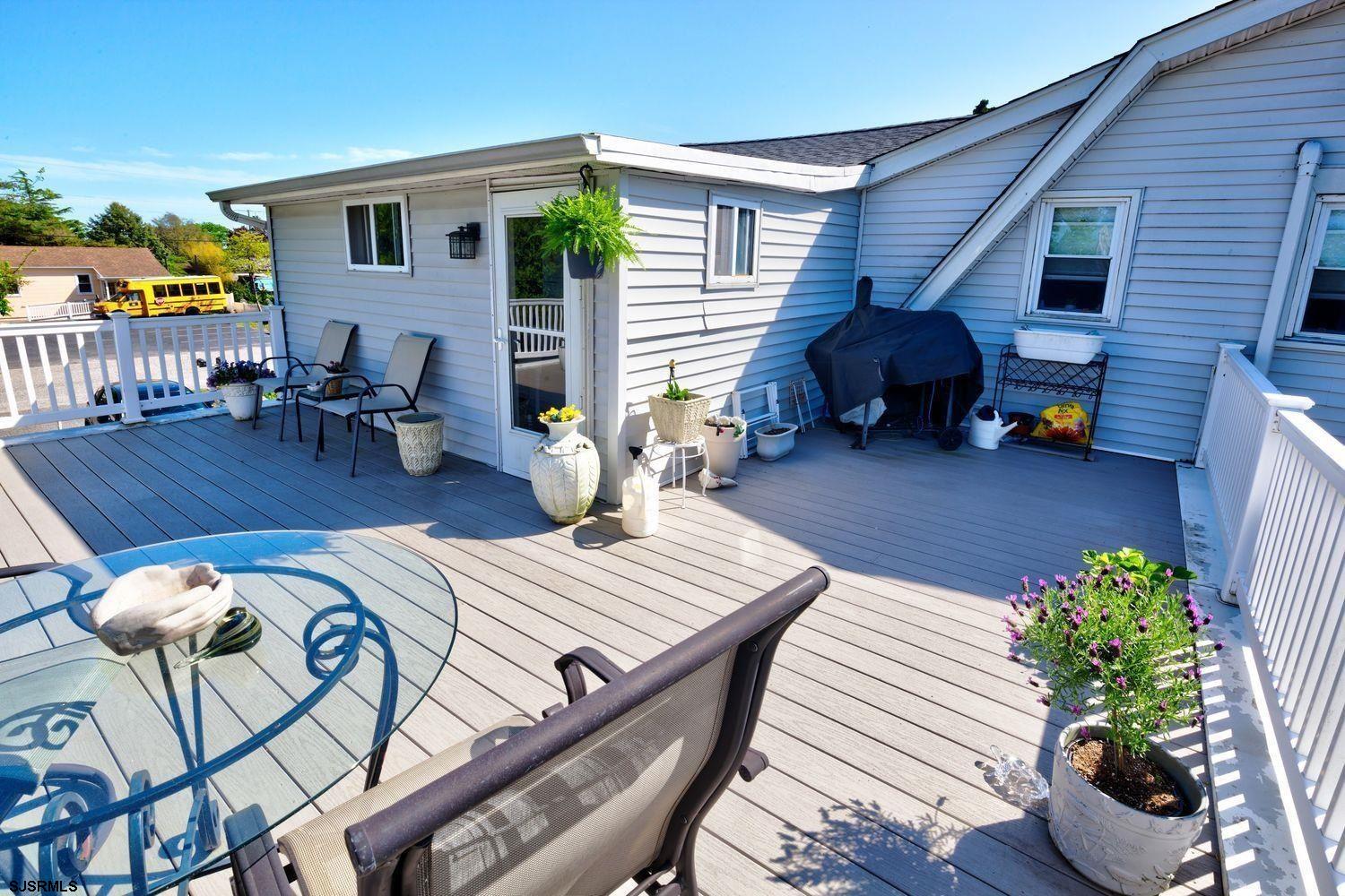 14 Lyndhurst Road Marmora, NJ 08223 - Photo 13 of 35 a view of a patio with furniture