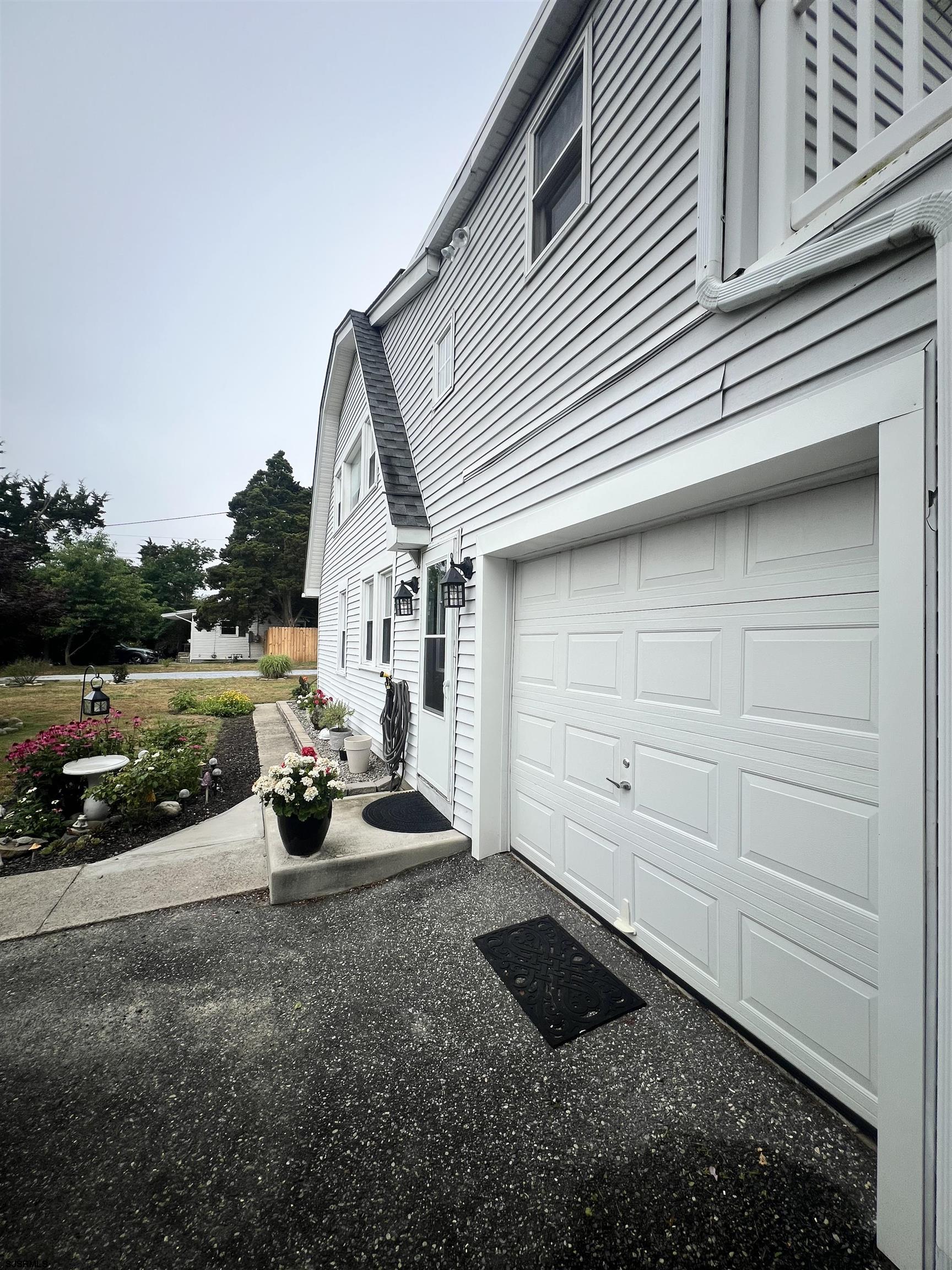 14 Lyndhurst Road Marmora, NJ 08223 - Photo 28 of 35 a view of a back yard of the house