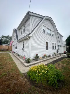 a view of backyard with green space