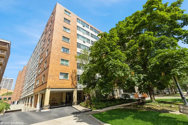 front view of a building with a yard