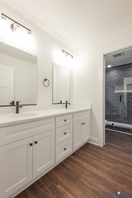 2355 Wickham Road Bumpass, VA 23024 - Photo 26 of 43 a spacious bathroom with double sink and a mirror