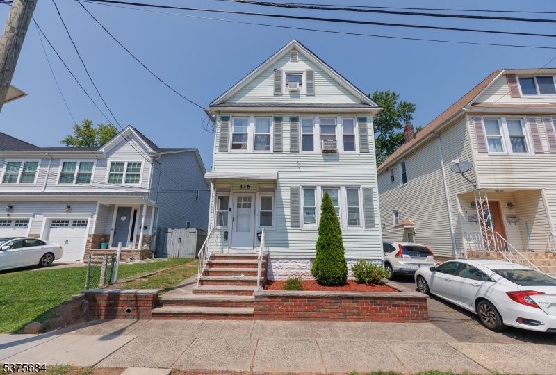 116 West 17th Street Linden, NJ 07036 - Photo 2 of 12 a front view of a house with a yard