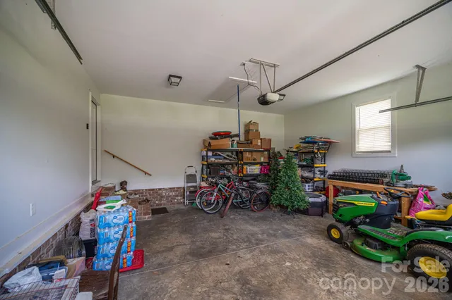 a view of a room with lots of stuff and hardwood floor