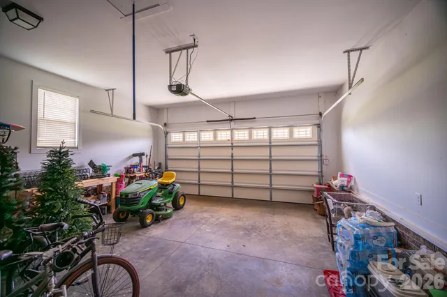a view of a lounge chairs in a backyard