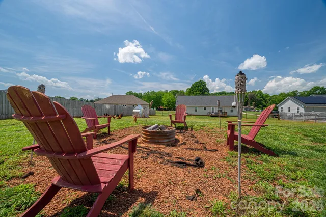 a view of an chairs and tables in the patio
