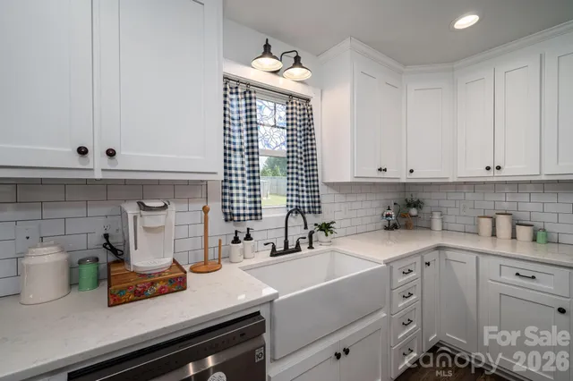 a living room with furniture fireplace and a flat screen tv