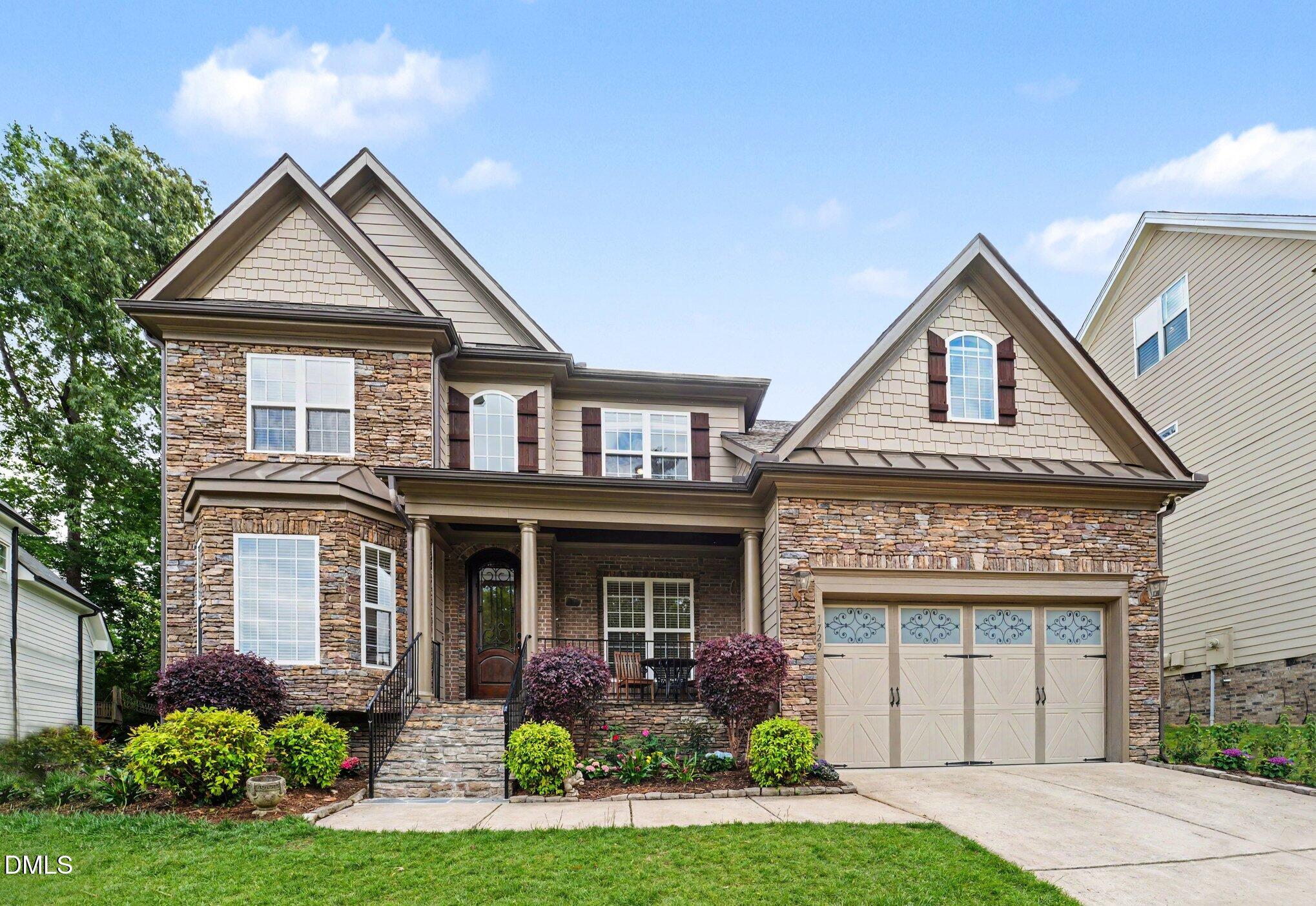 1729 Frenchwood Drive Raleigh, NC 27612 - Photo 43 of 46 front view of a house with a yard
