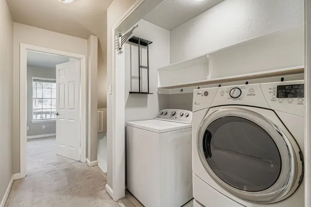 a view of a balcony with wooden fence and floor