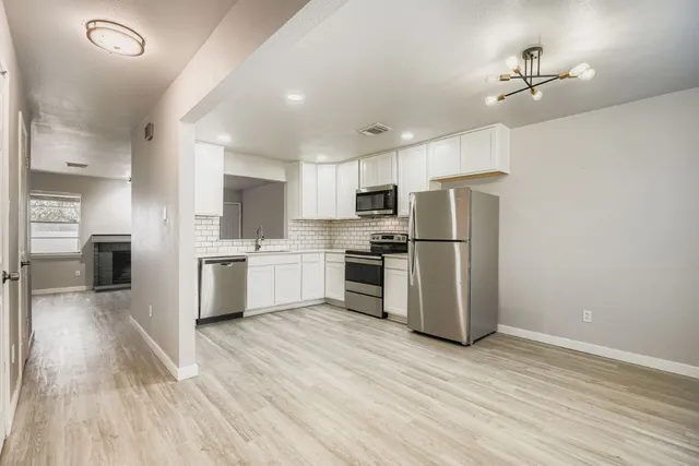 a view of swimming pool from a balcony