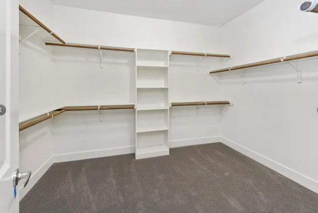 a view of an empty walk in closet