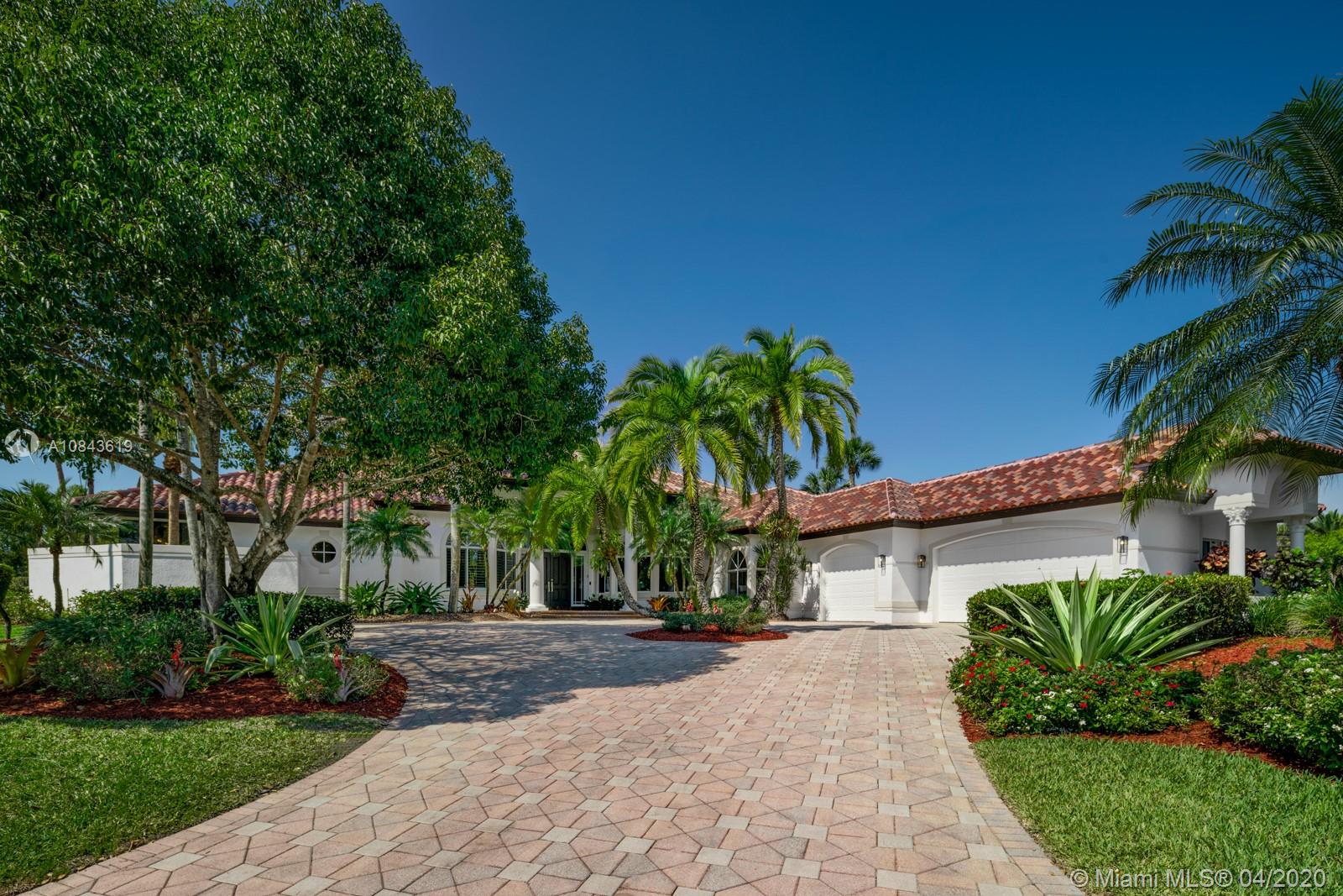 2725 Windmill Ranch Road Weston, FL 33331 - Photo 12 of 42 Large circular driveway. Perfectly positioned house sitting off street for privacy.