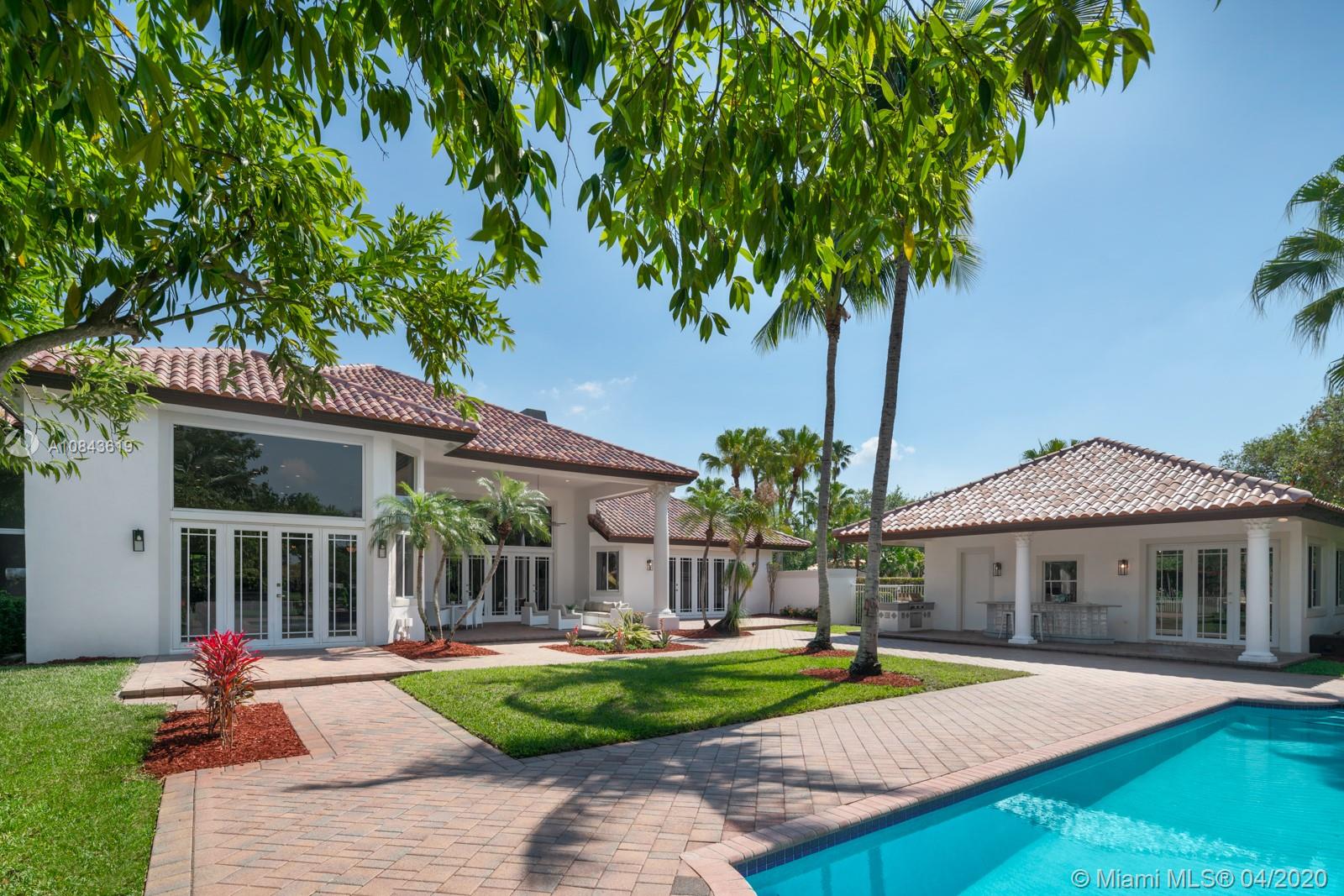2725 Windmill Ranch Road Weston, FL 33331 - Photo 14 of 42 Outdoor covered patio, summer kitchen, guest house, pool/spa deck offering a delightful alfresco experience.