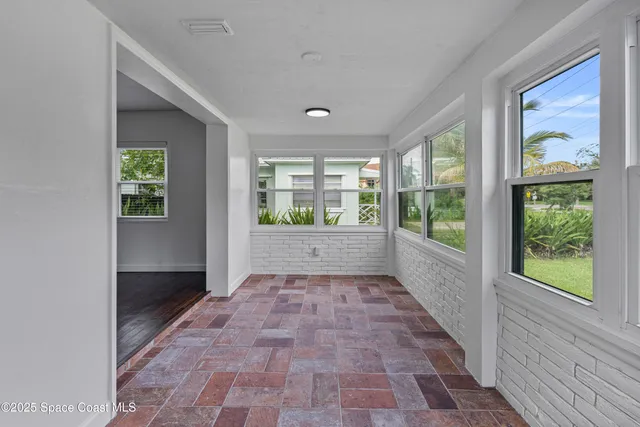 an empty room with windows