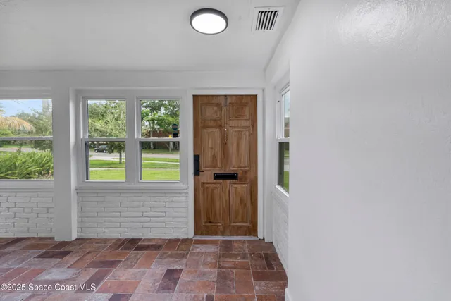 a view of a room with a porch