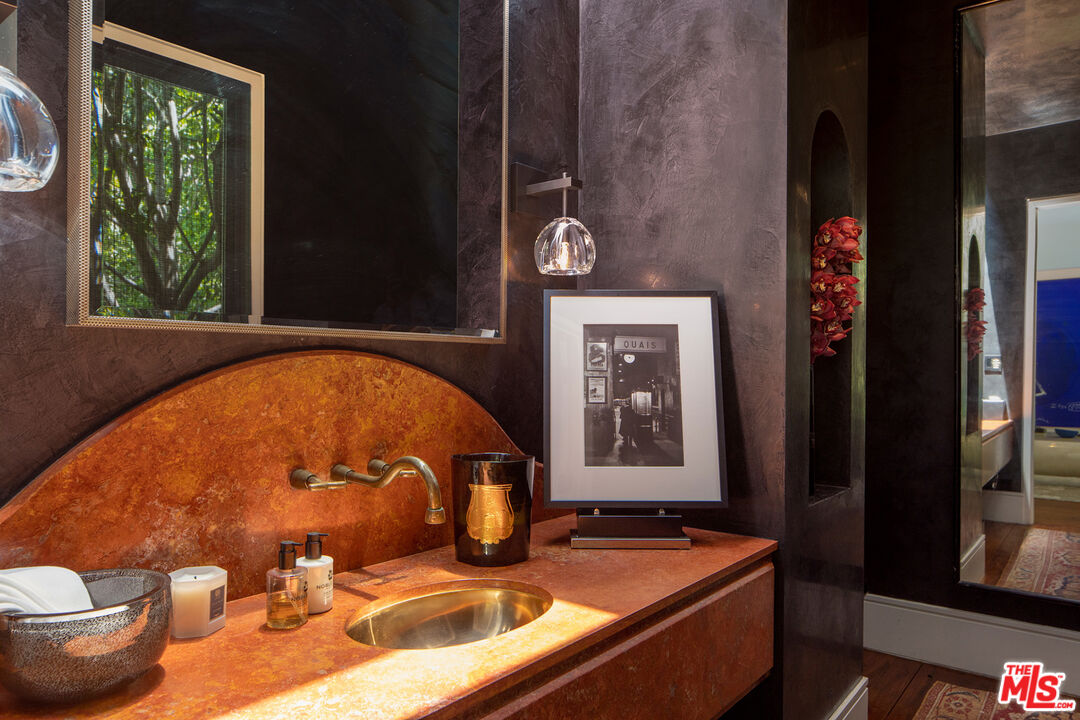 1192 Cabrillo Drive Beverly Hills, CA 90210 - Photo 14 of 43 a view of swimming pool with a window