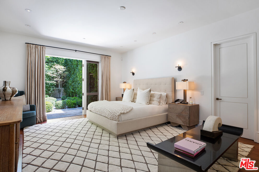 1192 Cabrillo Drive Beverly Hills, CA 90210 - Photo 20 of 43 a living room with furniture and a large window