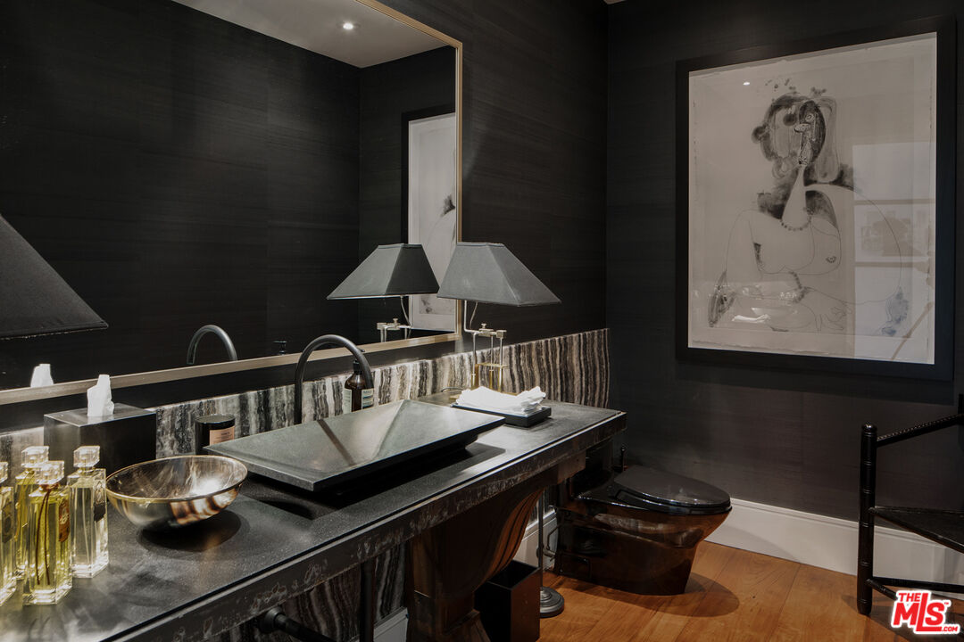 1192 Cabrillo Drive Beverly Hills, CA 90210 - Photo 24 of 43 a living room with furniture and wooden floor