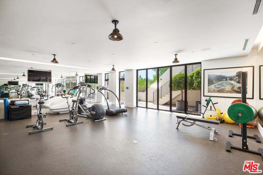 1192 Cabrillo Drive Beverly Hills, CA 90210 - Photo 34 of 43 a view of a room with gym equipment