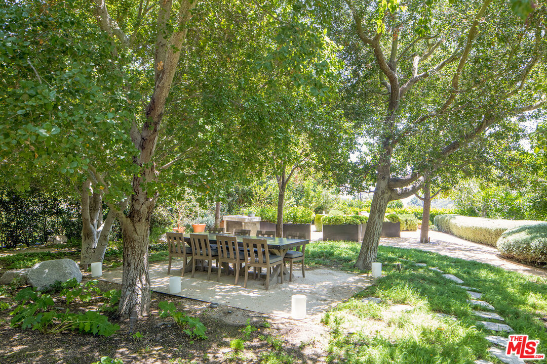 1192 Cabrillo Drive Beverly Hills, CA 90210 - Photo 36 of 43 a garden view with a seating space