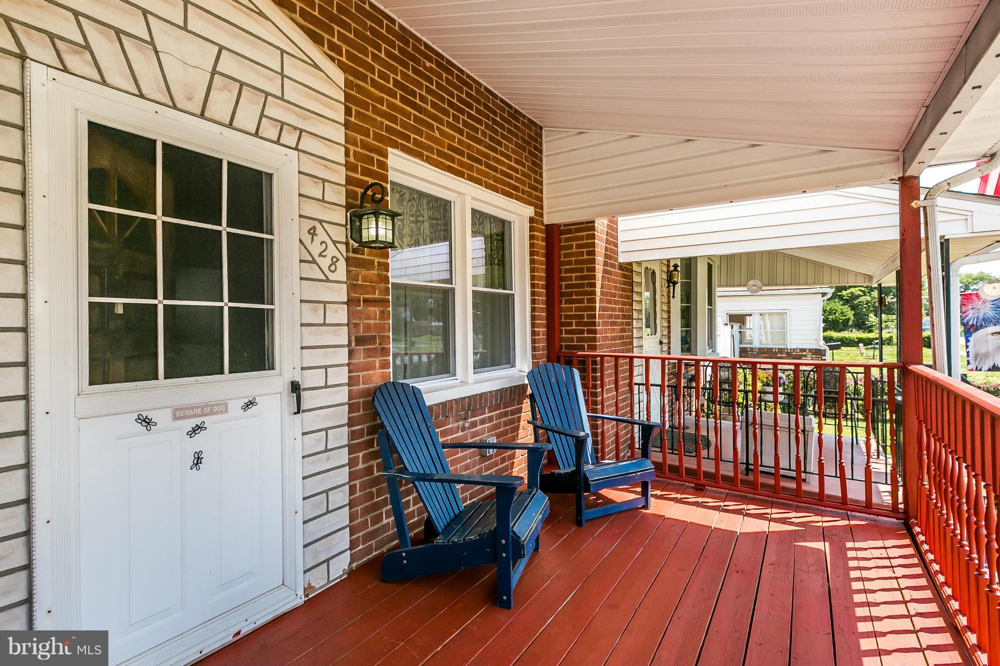 428 Trappe Road Baltimore, MD 21222 - Photo 3 of 30 a view of a two chairs in the balcony