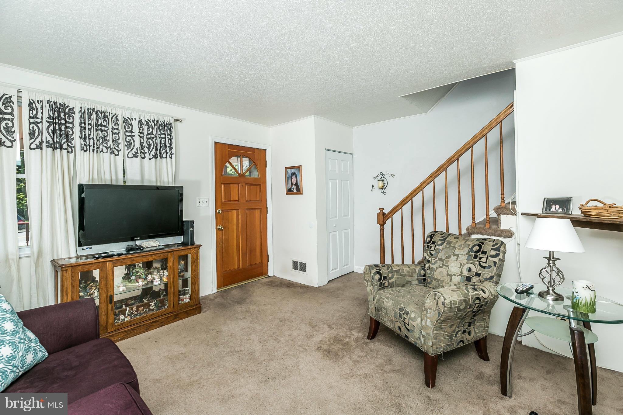 428 Trappe Road Baltimore, MD 21222 - Photo 4 of 30 a living room with furniture and a flat screen tv