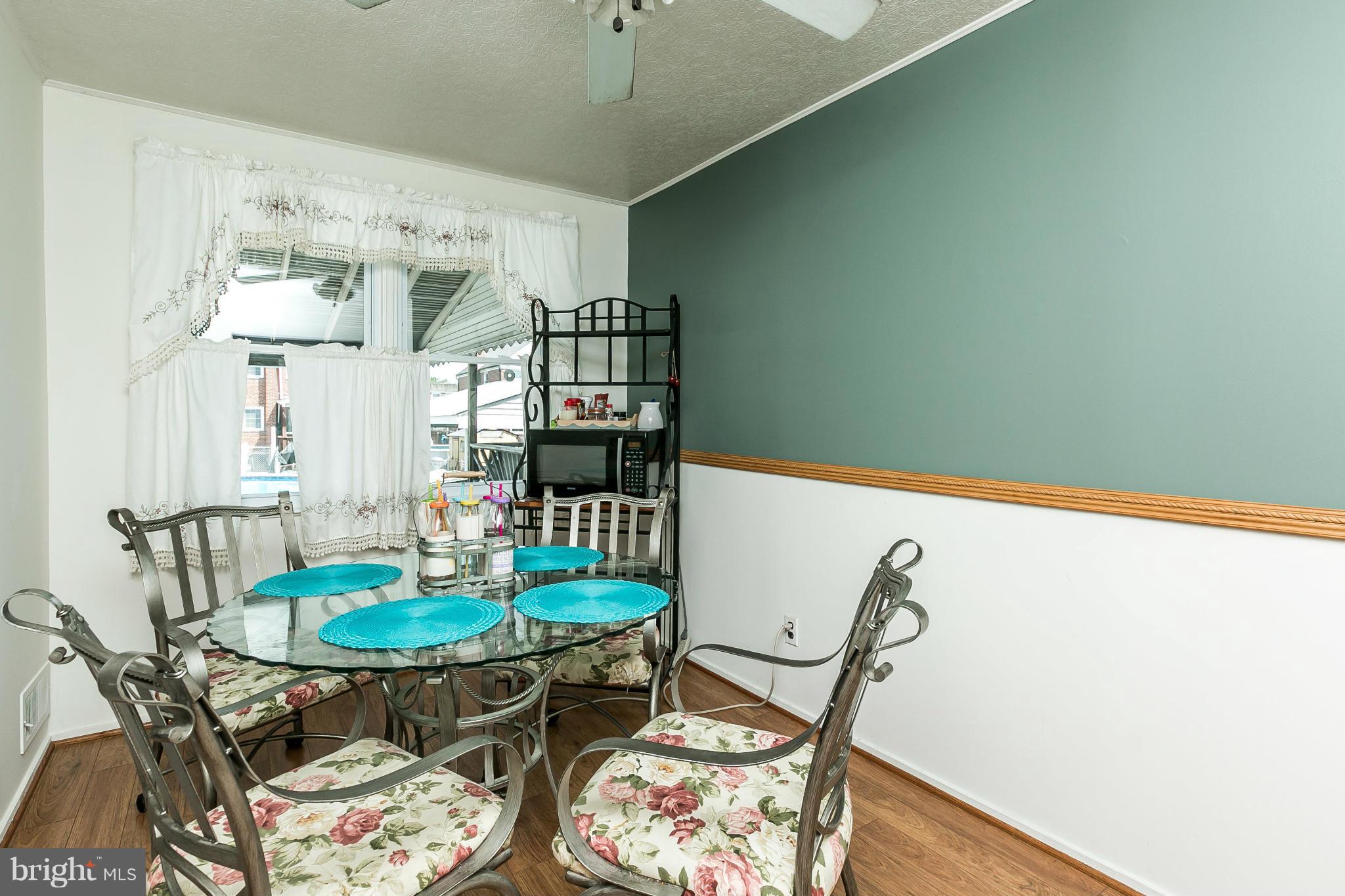 428 Trappe Road Baltimore, MD 21222 - Photo 8 of 30 a table and chairs in a room