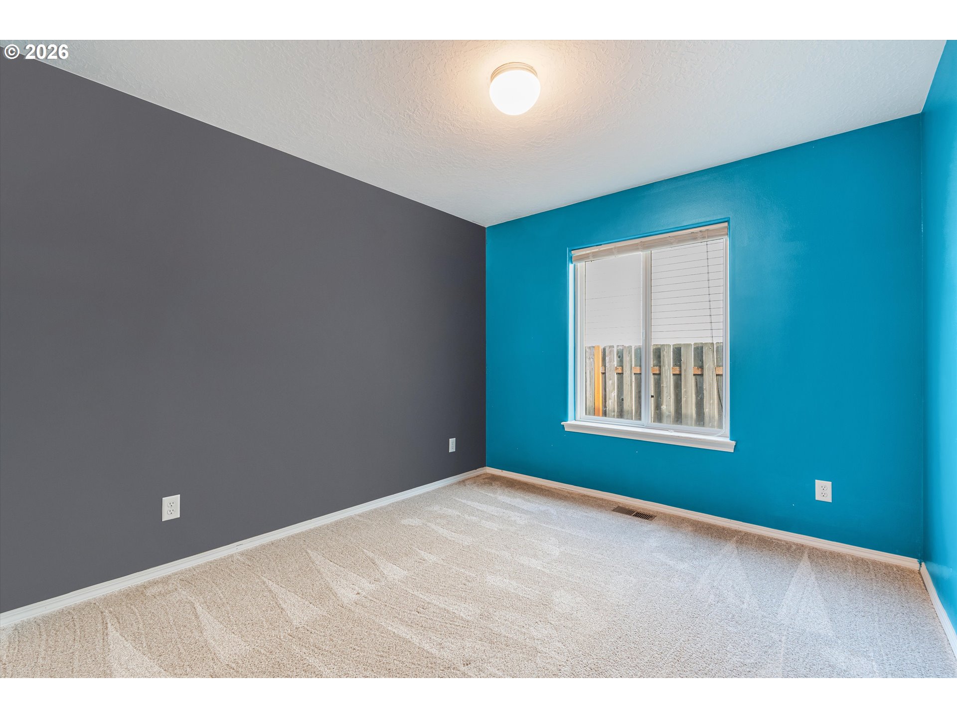 1407 Southeast 7th Avenue Canby, OR 97013 - Photo 18 of 31 a view of an empty room with a window