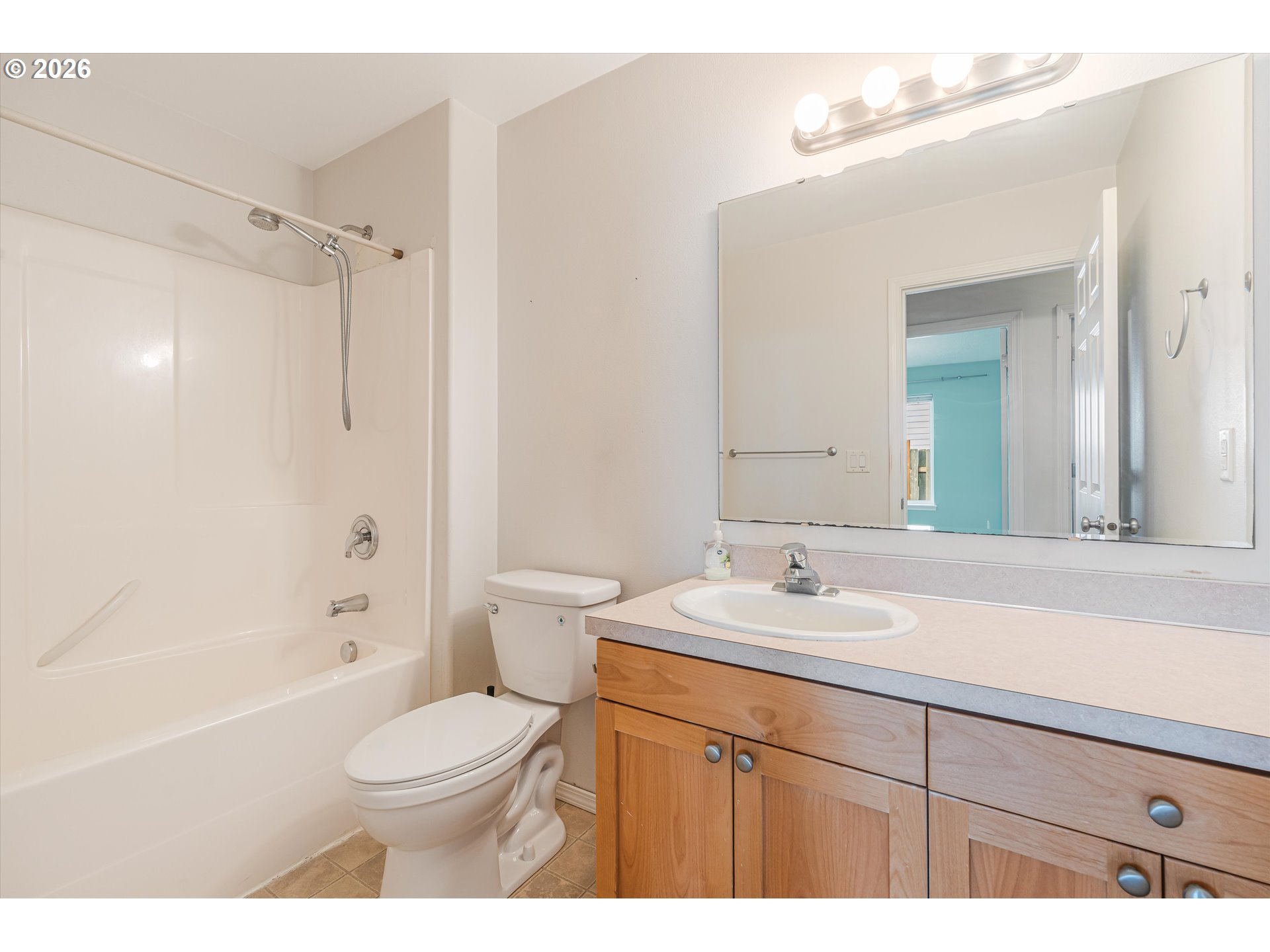 1407 Southeast 7th Avenue Canby, OR 97013 - Photo 22 of 31 a bathroom with a sink vanity toilet and shower